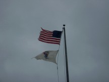 Flags Whipping at Entry to Island Beach Noreaster full blast