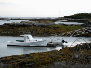 Maine Coast's Long Fingers of land and sturdy typical boat